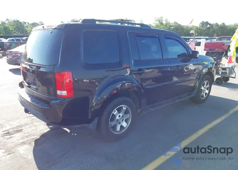 2011 Honda Pilot Touring z USA, uszkodzony, nr VIN 5FNYF3H92BB054541